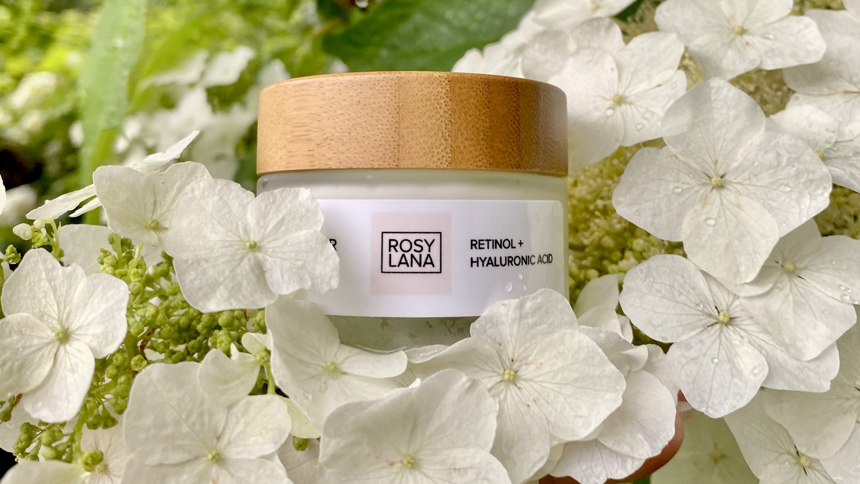 retinol moisturizer on with white flowers