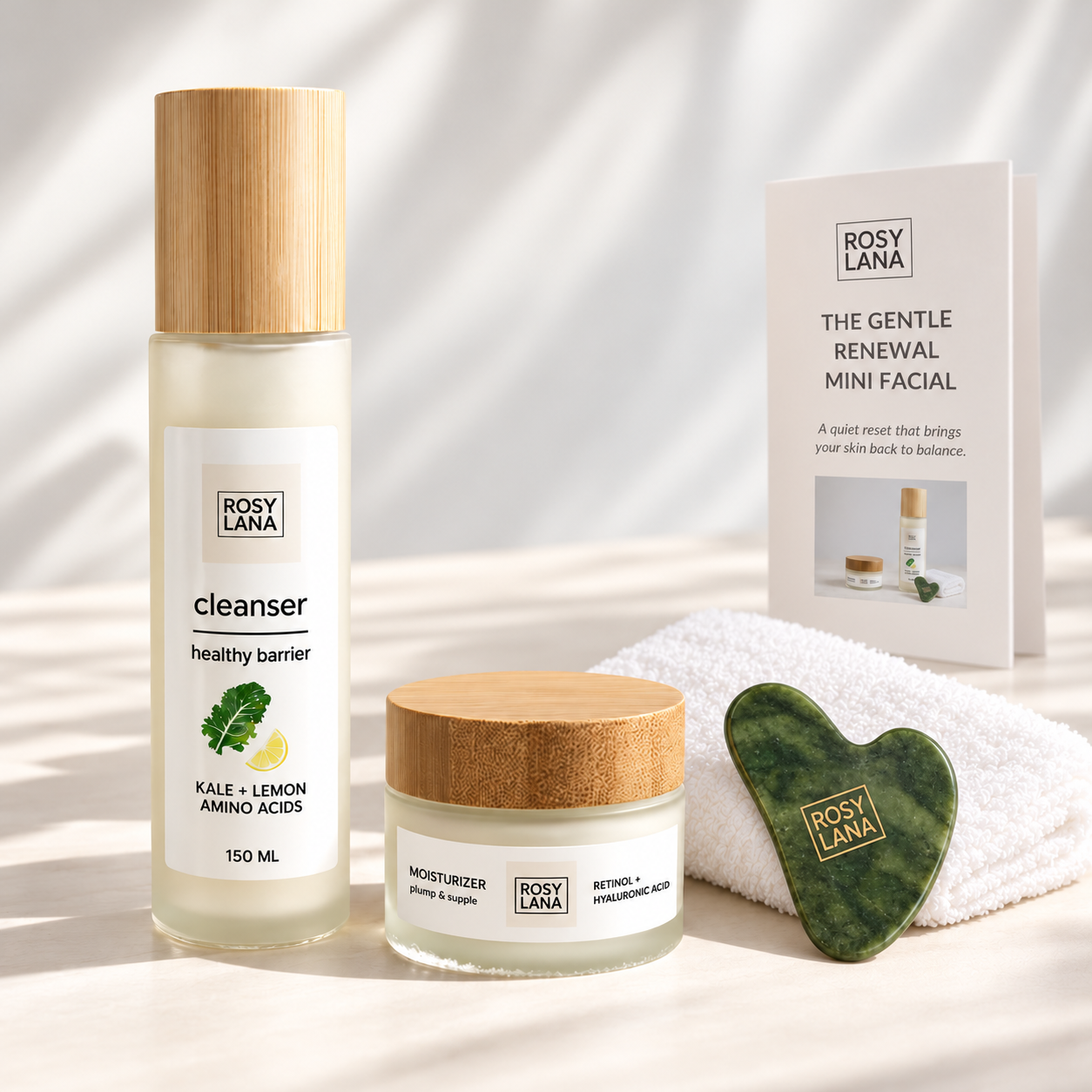 Rosy Lana Gentle Renewal Mini Facial with skincare, a folded white face towel, green jade gua sha and ritual guide on a light background