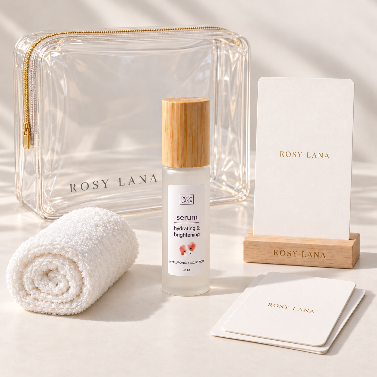 Rosy Lana Brightening Hyaluronic Serum Radiance Infusion Ritual with pouch, facial towel, cards, and wooden stand
